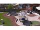 Enjoy a serene backyard with a dining patio, BBQ, and a trampoline surrounded by manicured landscaping at 4840 Point Mesa St, Castle Rock, CO 80108