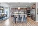 Spacious kitchen featuring stainless steel appliances, granite countertops and a large island with a breakfast bar at 4840 Point Mesa St, Castle Rock, CO 80108