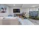 Spacious playroom with comfortable seating, mounted TV, fun toys, and playful decor at 4840 Point Mesa St, Castle Rock, CO 80108