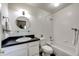 Clean bathroom featuring a tub and shower combination at 52900 E 88Th Ave, Strasburg, CO 80136