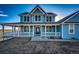 Charming two-story home with a covered porch and great curb appeal at 52900 E 88Th Ave, Strasburg, CO 80136