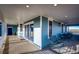 Covered porch with comfortable seating and views of the surrounding landscape at 52900 E 88Th Ave, Strasburg, CO 80136