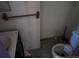 Compact bathroom featuring standard fixtures; in need of cleaning at 660 Hickory St, Hudson, CO 80642