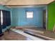 Bedroom featuring new wood laminate flooring and a window, offering comfort and natural light at 660 Hickory St, Hudson, CO 80642