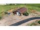 Aerial shot of a barn on a rural property, with easy access from a paved driveway at 11784 Spruce Mountain Rd, Larkspur, CO 80118