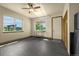 Large, light-filled bonus room with scenic views, access to the outdoors, and an open floorplan at 11784 Spruce Mountain Rd, Larkspur, CO 80118