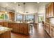 Spacious kitchen with a large island, stainless appliances, and beautiful views at 11784 Spruce Mountain Rd, Larkspur, CO 80118