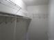 A closet includes shelving for convenient storage and organization at 17331 E Mansfield Ave # 311L, Aurora, CO 80013
