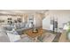 Open-concept living room featuring stylish decor, a comfortable sofa, and seamless flow to the kitchen at 3193 Belleville Ridge Rd, Elizabeth, CO 80107