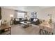 Comfortable living room with plush sofas, stylish décor, and plenty of natural light at 3193 Belleville Ridge Rd, Elizabeth, CO 80107