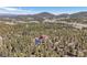Secluded mountain home nestled within a forest with mountain views at 10786 Marclif Rd, Conifer, CO 80433