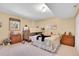 Comfortable bedroom featuring a bunk bed, window, and two dressers at 10786 Marclif Rd, Conifer, CO 80433