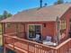 Inviting deck with sliding glass doors, offering scenic views and ample space for outdoor relaxation at 10786 Marclif Rd, Conifer, CO 80433