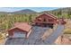 Charming home featuring an attached two car garage and beautiful mountain views at 10786 Marclif Rd, Conifer, CO 80433
