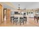 Kitchen with stainless appliances, granite countertops, and an eat-in breakfast bar at 10786 Marclif Rd, Conifer, CO 80433