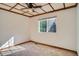 Neutral bedroom with carpet, coffered ceiling, and large window at 9602 S Hackberry St, Highlands Ranch, CO 80129