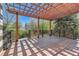 Spacious deck with a pergola overlooking the backyard at 9602 S Hackberry St, Highlands Ranch, CO 80129