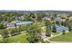 Beautiful aerial view of the community amenities, including a pool, tennis courts, playground, and green spaces at 5323 E Hamilton Ave, Castle Rock, CO 80104