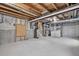 Unfinished basement with exposed ductwork and concrete walls, ready for customization at 5323 E Hamilton Ave, Castle Rock, CO 80104