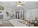 Comfortable bedroom featuring a ceiling fan, closet, and ample natural light at 5323 E Hamilton Ave, Castle Rock, CO 80104