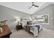 Serene bedroom with a vaulted ceiling, plush bedding, and a large window offering ample natural light at 5323 E Hamilton Ave, Castle Rock, CO 80104