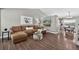Cozy living room featuring wood floors, a comfortable sofa, and stylish decor at 5323 E Hamilton Ave, Castle Rock, CO 80104