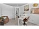 Bright office space with desk, chair, and door leading to bathroom at 5323 E Hamilton Ave, Castle Rock, CO 80104