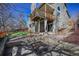 Large private backyard with stone patio, in ground fire pit and plenty of space at 9443 Palisade Ct, Highlands Ranch, CO 80130