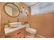 Stylish powder room with modern fixtures and a unique vessel sink at 9443 Palisade Ct, Highlands Ranch, CO 80130