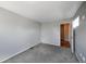 Bedroom with neutral carpet and paint at 9443 Palisade Ct, Highlands Ranch, CO 80130