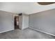 Spacious bedroom with modern gray paint, plush carpet, closet and ensuite bath at 9443 Palisade Ct, Highlands Ranch, CO 80130