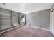 Bedroom with built in bookshelves and a window bringing in natural light at 9443 Palisade Ct, Highlands Ranch, CO 80130