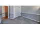 Bedroom featuring a carpeted floor, chair railing and a closet with sliding doors at 9443 Palisade Ct, Highlands Ranch, CO 80130