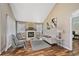 Inviting living room featuring a fireplace and vaulted ceilings for a cozy ambiance at 9443 Palisade Ct, Highlands Ranch, CO 80130