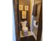 Toilet and standing shower in a bathroom with brown towels on the towel rack at 14282 E Radcliff Cir, Aurora, CO 80015
