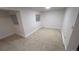 Bright bedroom features plush carpeting, white walls, and natural light from the horizontal-slat window coverings at 14282 E Radcliff Cir, Aurora, CO 80015
