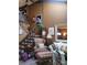 A living room showcasing a comfortable seating area, stairs, and decorative items at 14282 E Radcliff Cir, Aurora, CO 80015