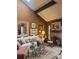 Inviting living room with a plush sofa, fireplace, and stylish decor at 14282 E Radcliff Cir, Aurora, CO 80015