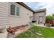 Side yard with garden beds provides opportunities for gardening and outdoor enjoyment at 4767 S Odessa St, Centennial, CO 80015