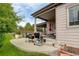 The backyard features a patio, cover and grill, perfect for outdoor entertaining and enjoying the serene surroundings at 4767 S Odessa St, Centennial, CO 80015