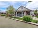 Spacious backyard features multiple patios, lush landscaping, and a bocce ball court, perfect for outdoor gatherings at 4767 S Odessa St, Centennial, CO 80015