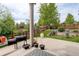 Landscaped backyard featuring patio, lawn, and wooden fence at 4767 S Odessa St, Centennial, CO 80015