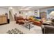 Finished basement with an entertaining space complete with comfortable seating and games at 4767 S Odessa St, Centennial, CO 80015