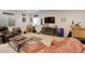 Finished basement featuring entertainment center and comfortable seating at 4767 S Odessa St, Centennial, CO 80015
