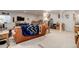 Basement living area with entertainment center and staircase to upper level at 4767 S Odessa St, Centennial, CO 80015