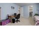 Bedroom with desk and nearby closet and access to additional rooms at 4767 S Odessa St, Centennial, CO 80015