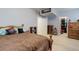 Bedroom featuring carpet, neutral paint, large window, and walk-in closet at 4767 S Odessa St, Centennial, CO 80015