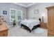 A bedroom with bright, natural light and a trey ceiling provides a relaxing space at 4767 S Odessa St, Centennial, CO 80015