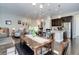 Dining room that opens to the kitchen and living space with hardwood flooring at 4767 S Odessa St, Centennial, CO 80015