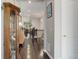 Spacious hallway with hardwood floors, providing a seamless flow to the rest of this lovely home at 4767 S Odessa St, Centennial, CO 80015